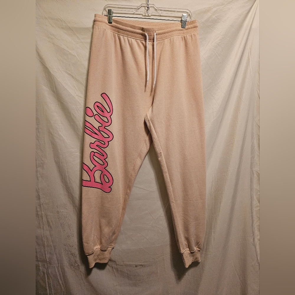 Barbie Graphic Joggers, Size 1X, Tan with pink logo text on the leg. NWT.